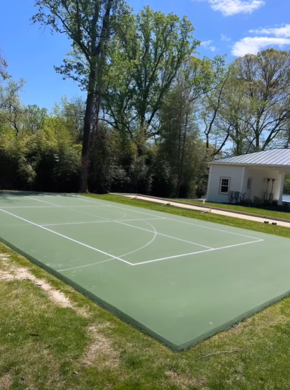 pickleball court with basketball lines - back creek builders